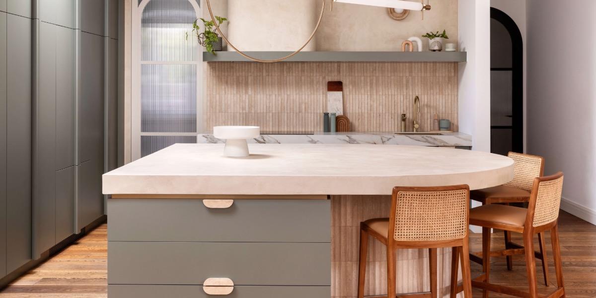 Melbourne's Olivia Cirocco (GIA Interiors) used beautiful concave mosaic travertine tile in this timeless kitchen. 